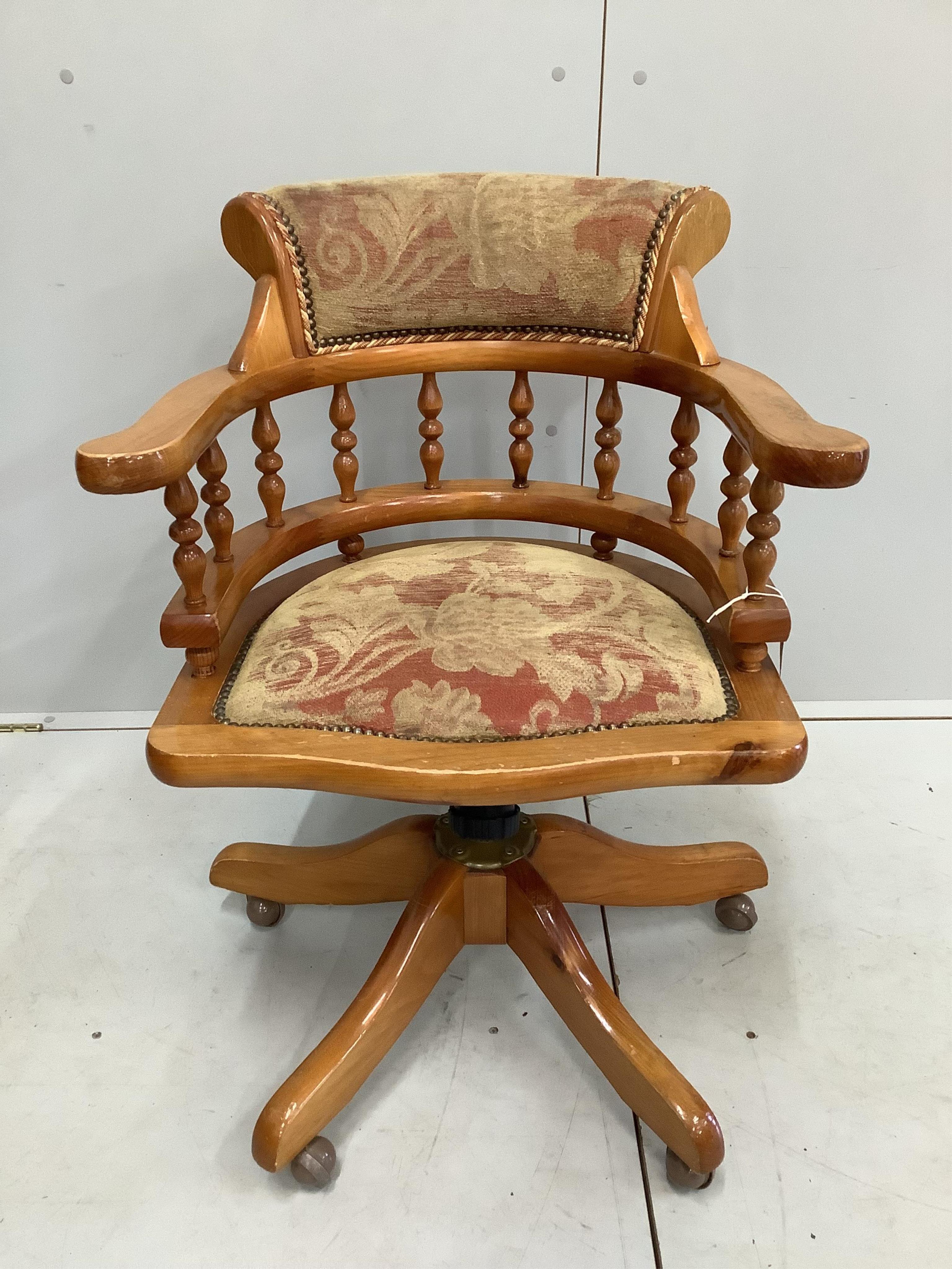 A Victorian style pine swivel desk chair, width 62cm, depth 53cm, height 82cm